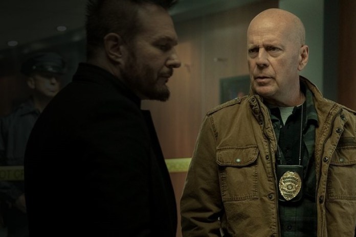 Bruce con Michael Eklund, un malo con el que su personaje tiene una relación...